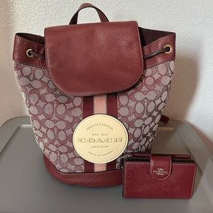 Coach Signature Design Backpack w/matching wallet. Limited edition wine color!